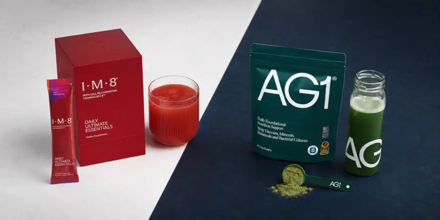 IM8 Daily Ultimate Essentials box and stick compared with an AG1 pouch, scoop and prepared drinks